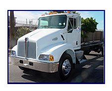 2003 Kenworth W-900 Heavy Spec with 2006 Edge Roll-OfF