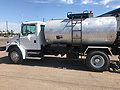 1999 Freightliner FL-80 with 2,000 Gallon Rosco Distributor