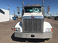 2006 Peterbilt 385 with 3,150 Gallon Poly Water Tank Assembly on Flatbed 