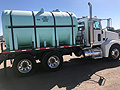 2006 Peterbilt 385 with 3,150 Gallon Poly Water Tank Assembly on Flatbed 