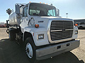 1989 Ford L9000 with 1,900 Gallon Computerized Bearcat Spreader